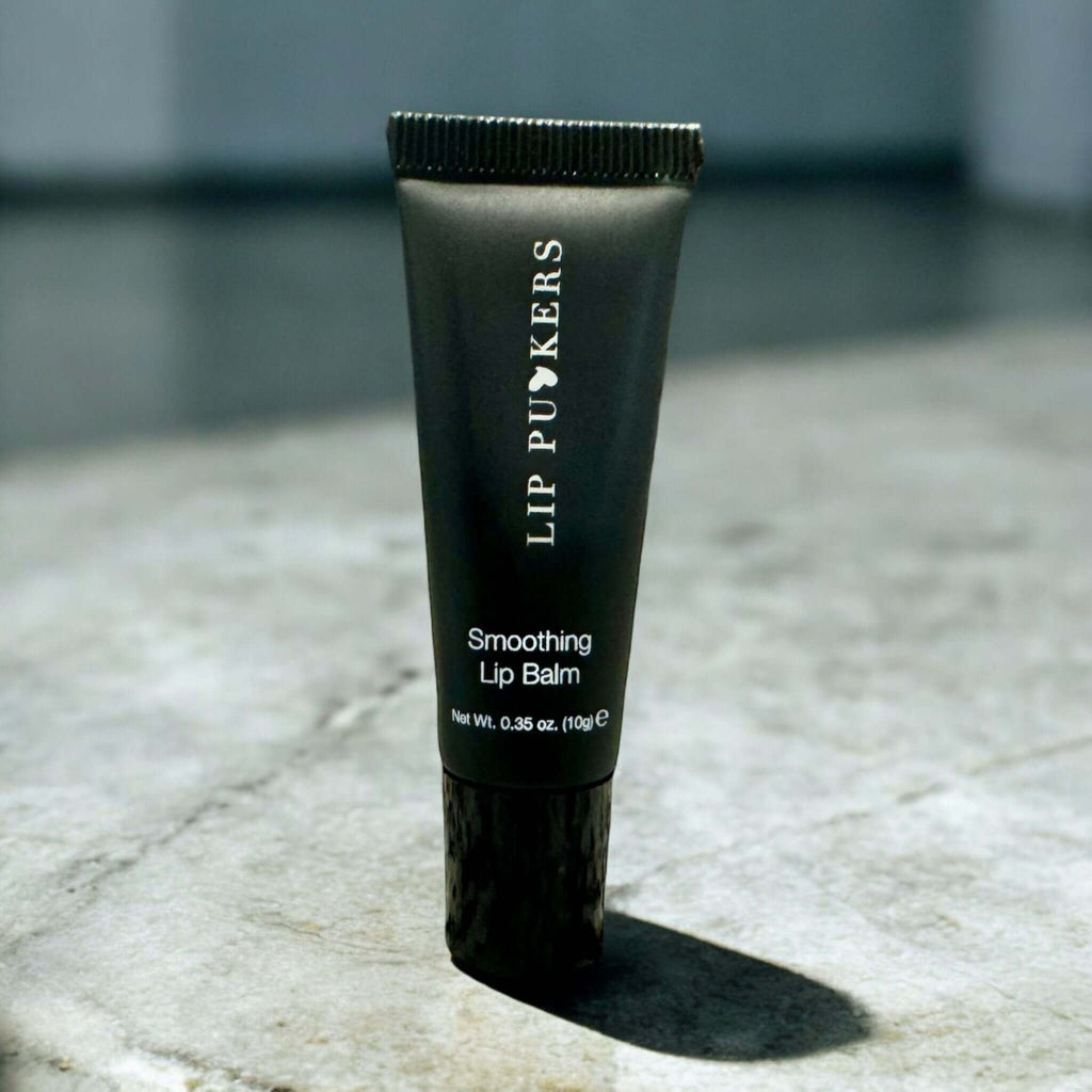 Vanilla lip balm tube with smooth creamy texture and subtle shimmer for deep hydration and antioxidant protection